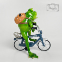 Figurka Porcelanowa Zielona Żaba Na Rowerze